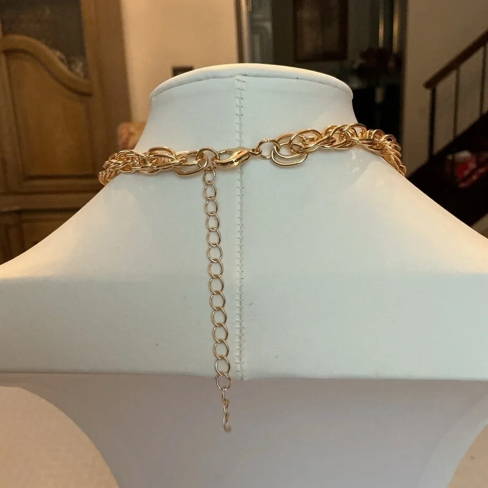 Brown Teardrop Gold Tone Pendant this necklace